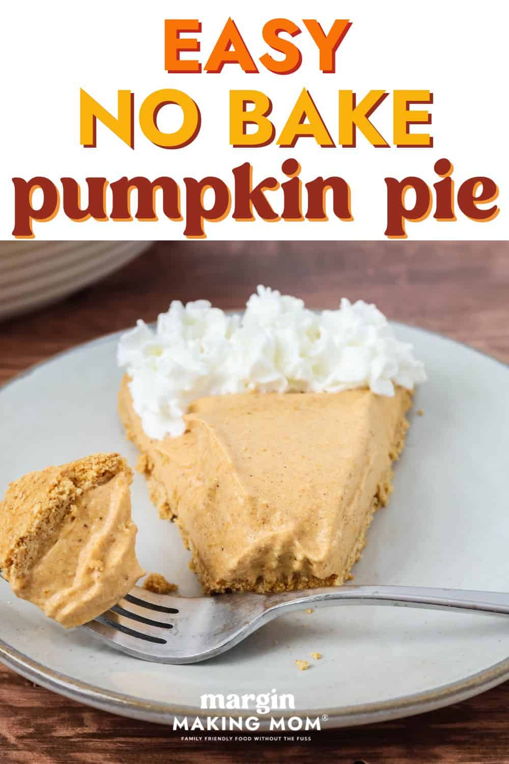 close-up view of a slice of no bake pumpkin pie on a plate, along with a fork that's holding a bite of the pie.
