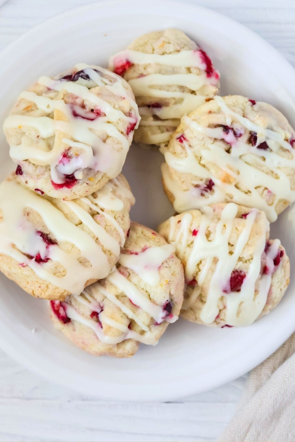 overhead view of a plate of cake mix cranberry orange cookies made with fresh cranberries.