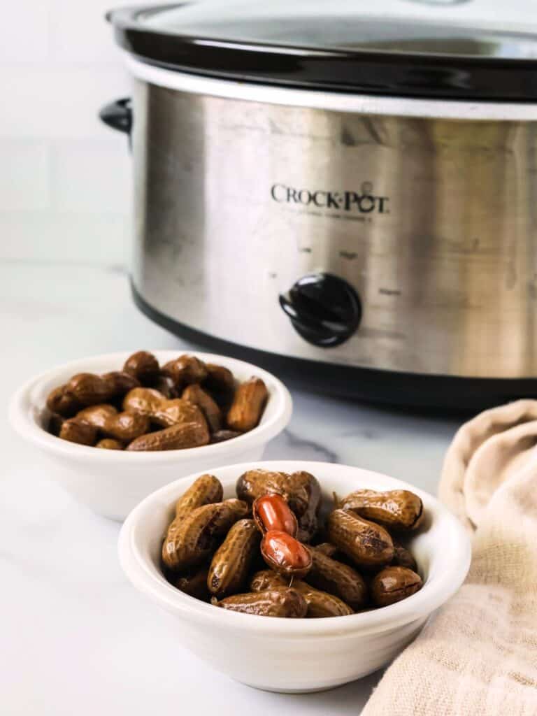 Crock Pot Boiled Peanuts served in small white bowls.