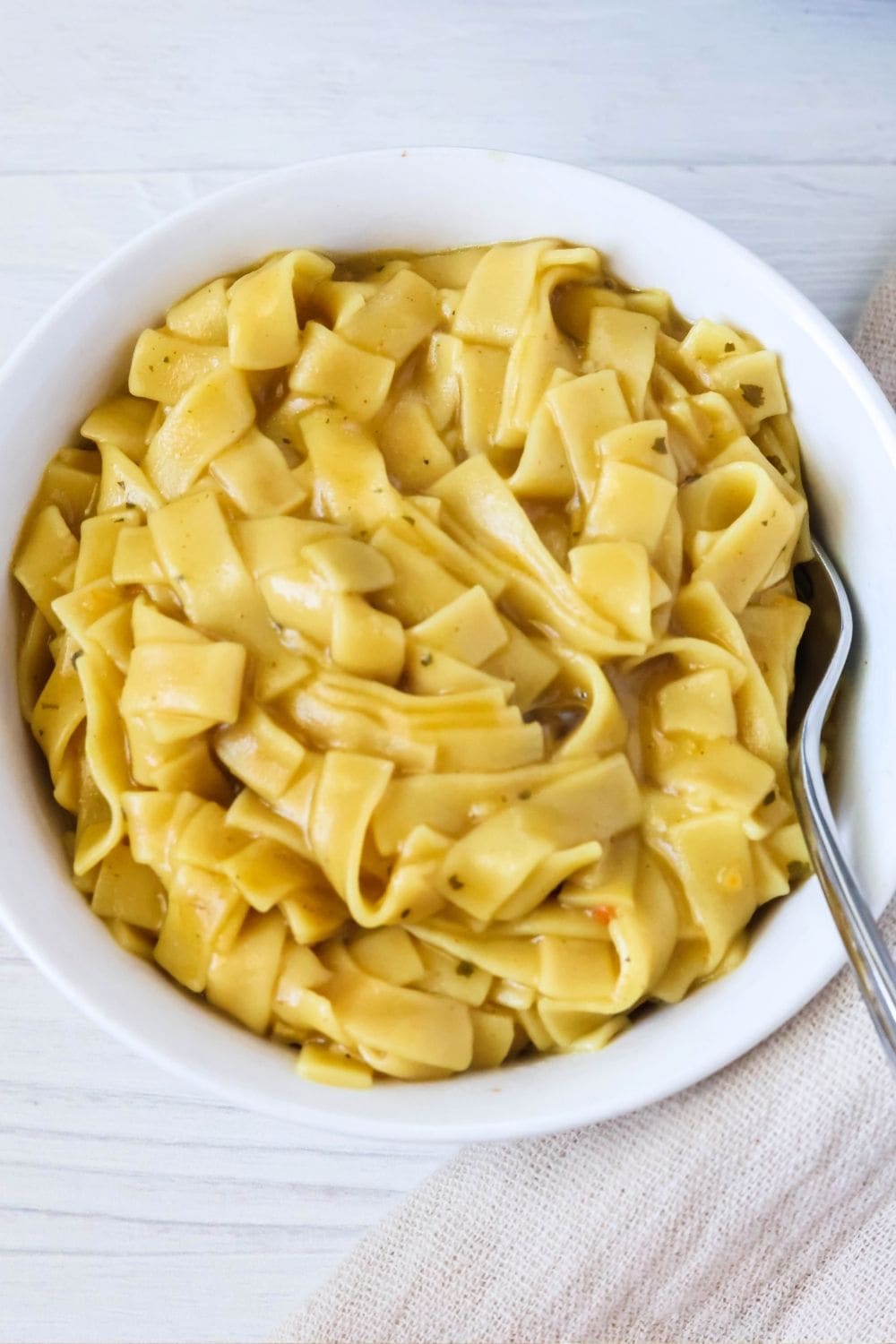 overhead view of a bowl of pressure cooker Knorr pasta sides with a fork in it.