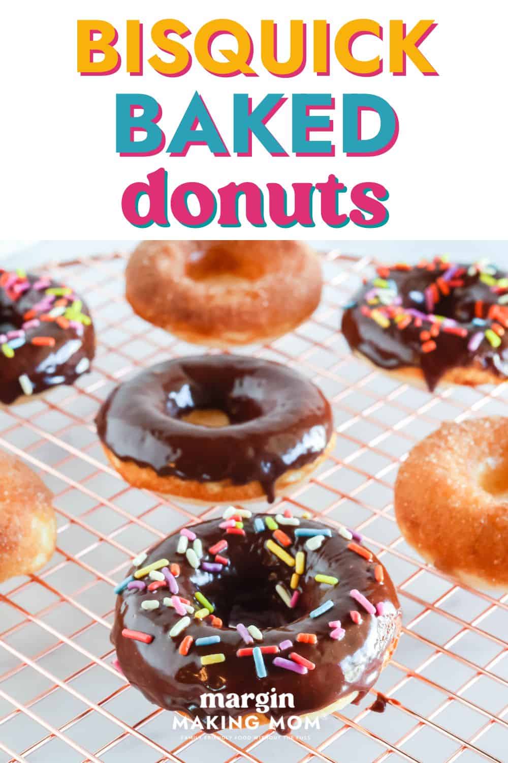 several Bisquick donuts on a wire rack, some topped with chocolate glaze and others topped with cinnamon sugar.