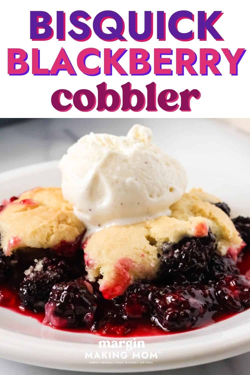 Bisquick blackberry cobbler on a white plate, showcasing the juicy blackberry filling and the biscuit-like Bisquick cobbler topping. A scoop of vanilla ice cream is on top of the cobbler.