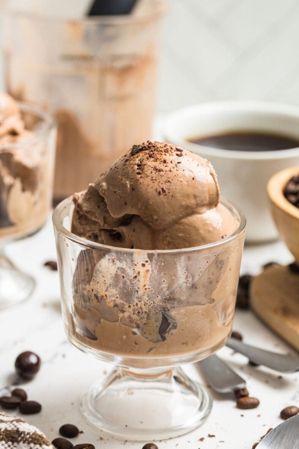 espresso ice cream made in the Ninja Creami is served in glass dessert cups.