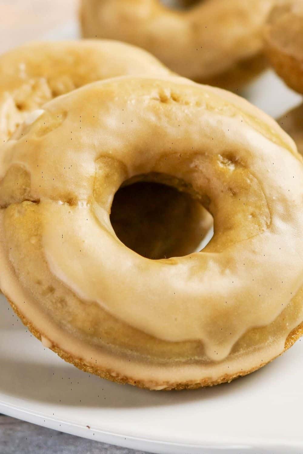 Bisquick coffee donut close-up, showing the coffee-flavored glaze on top of the baked donut.