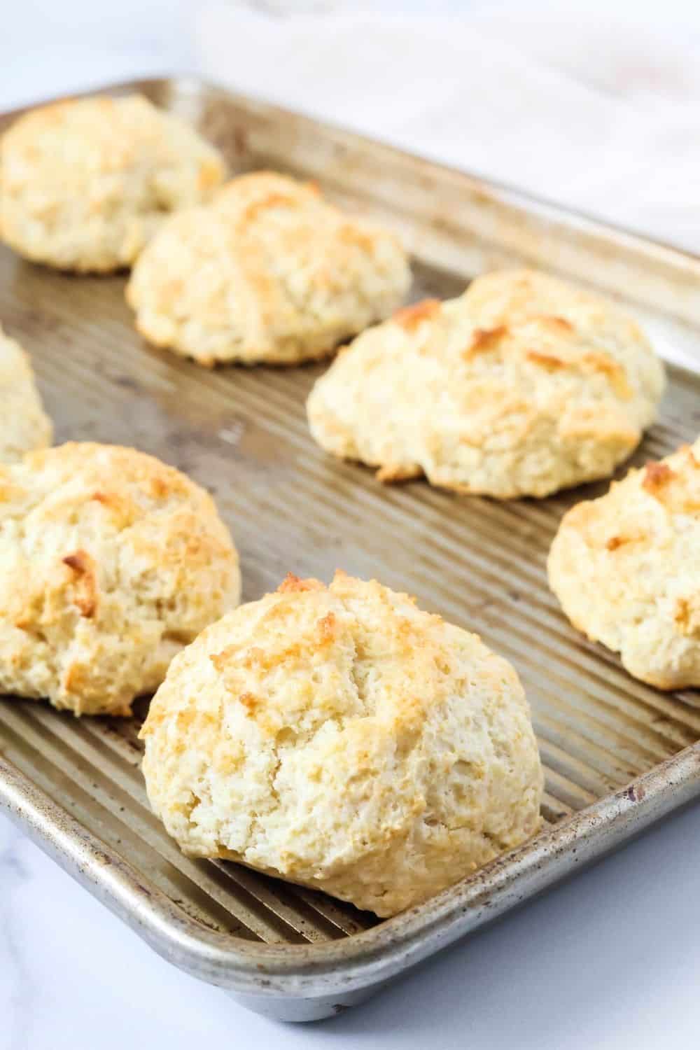 a baking sheet of freshly baked shortcut drop biscuits.
