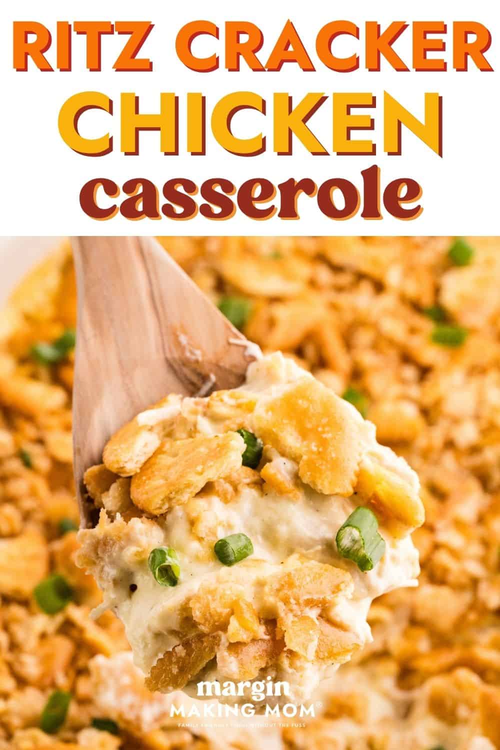 A wooden spoon scoops out a serving of ritz cracker chicken casserole from a baking dish.