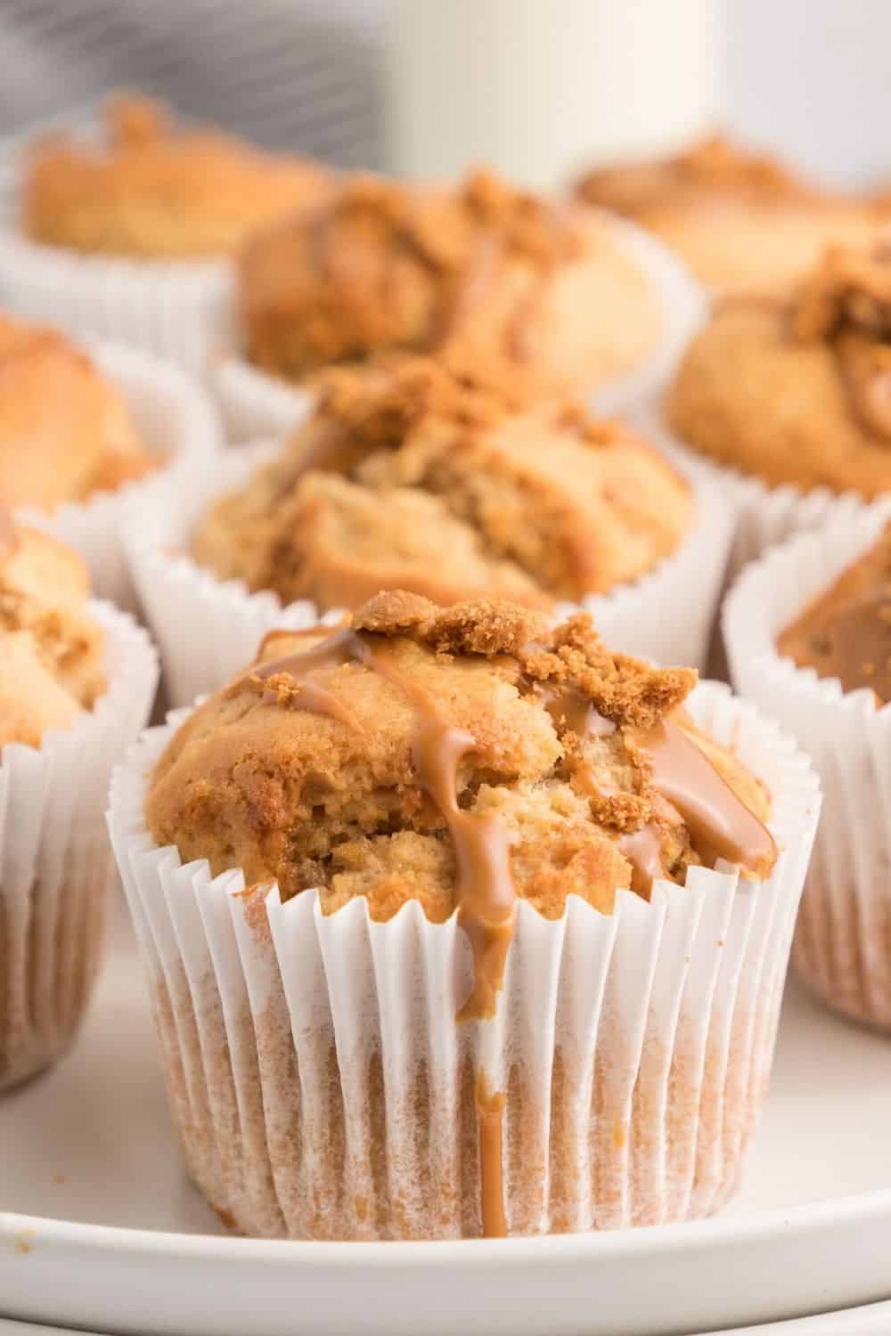 close-up view of Biscoff cookie butter muffins on a white tray.
