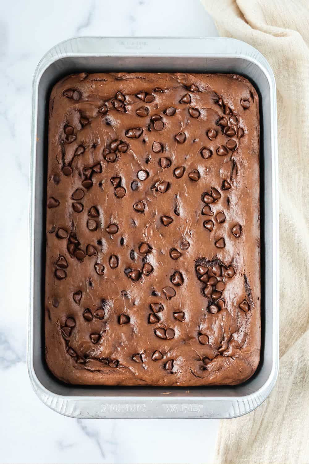 overhead view of chocolate pudding dump cake in a cake pan.