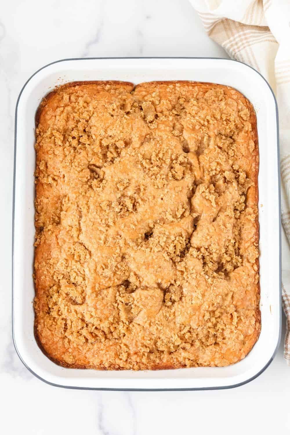 Overhead view of apple pie dump cake in a 9x13" cake pan.