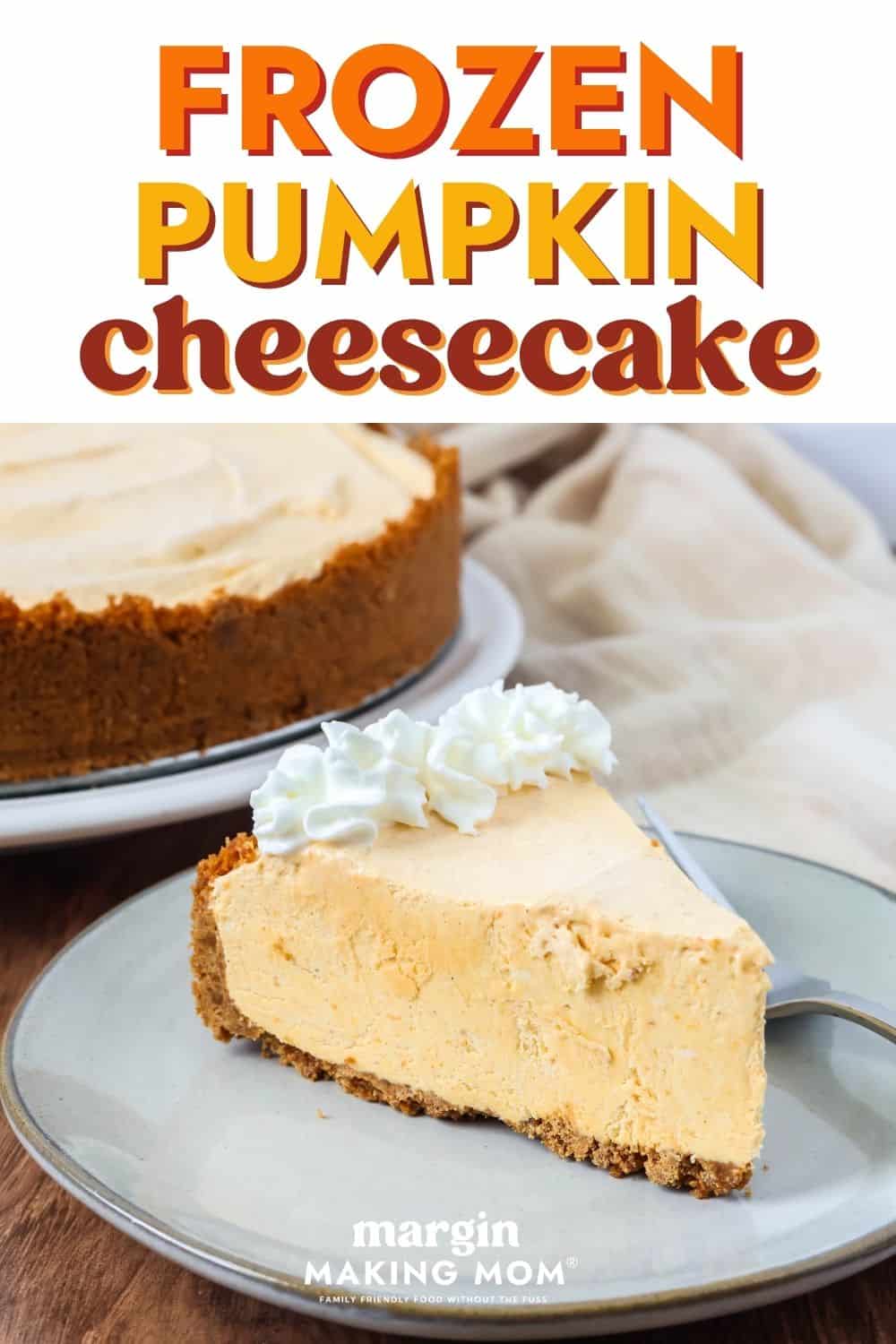 Slice of frozen pumpkin cheesecake on an ivory plate, garnished with whipped cream.