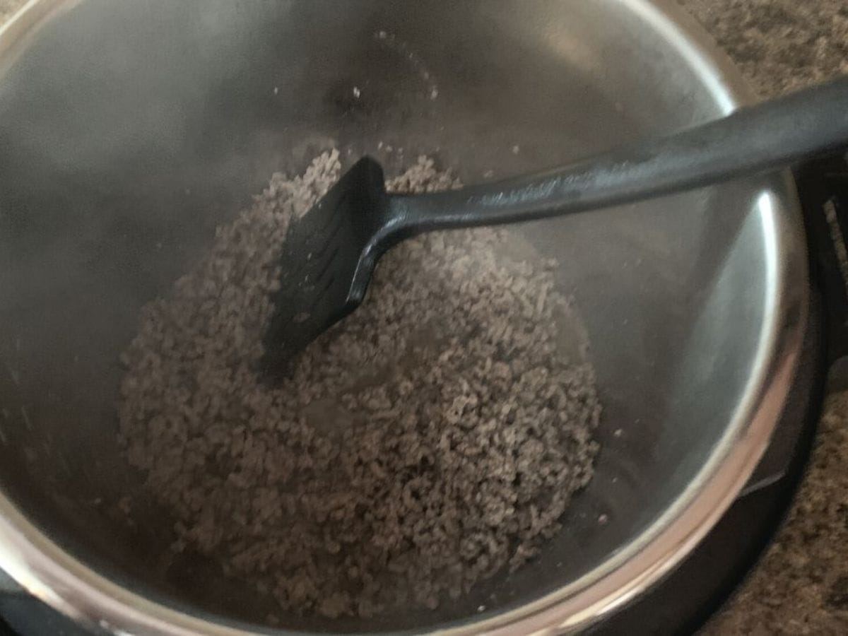 browned ground beef in the Instant Pot for making Cincinnati chili.