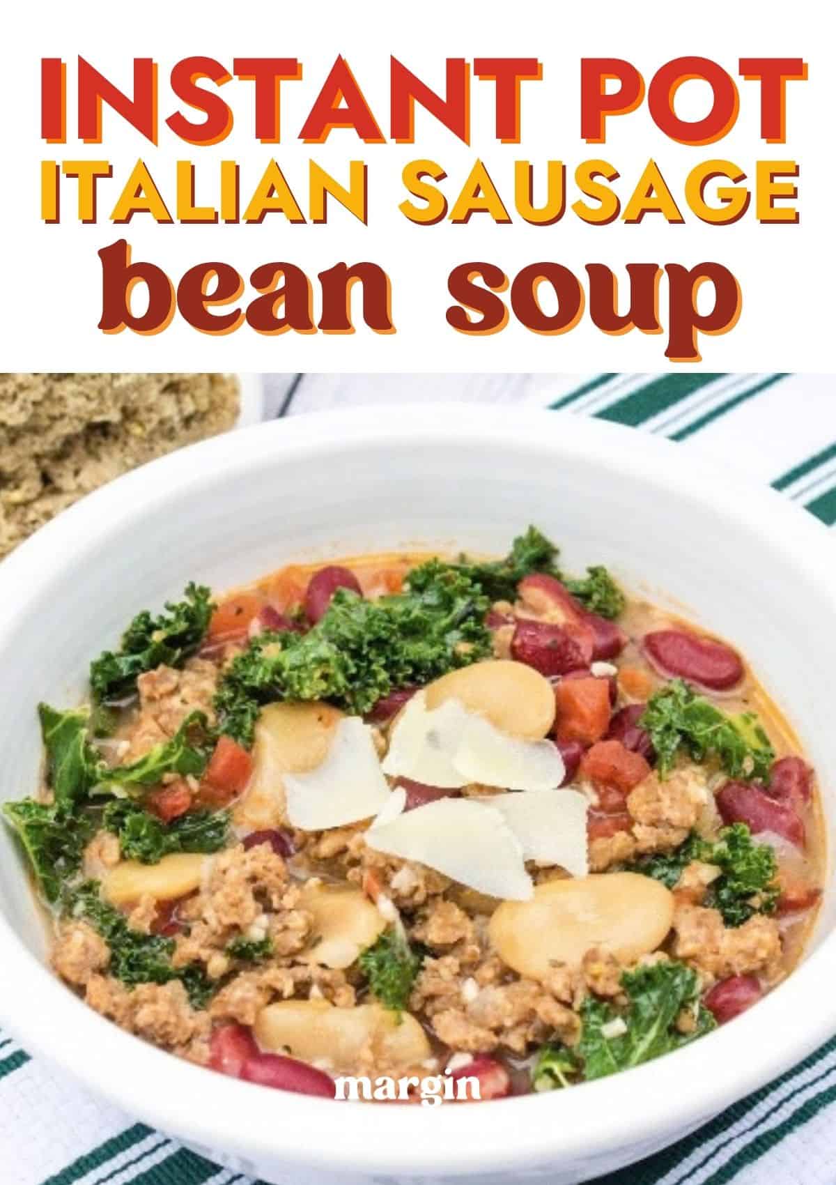 Italian sausage and bean soup with kale served in a white bowl.