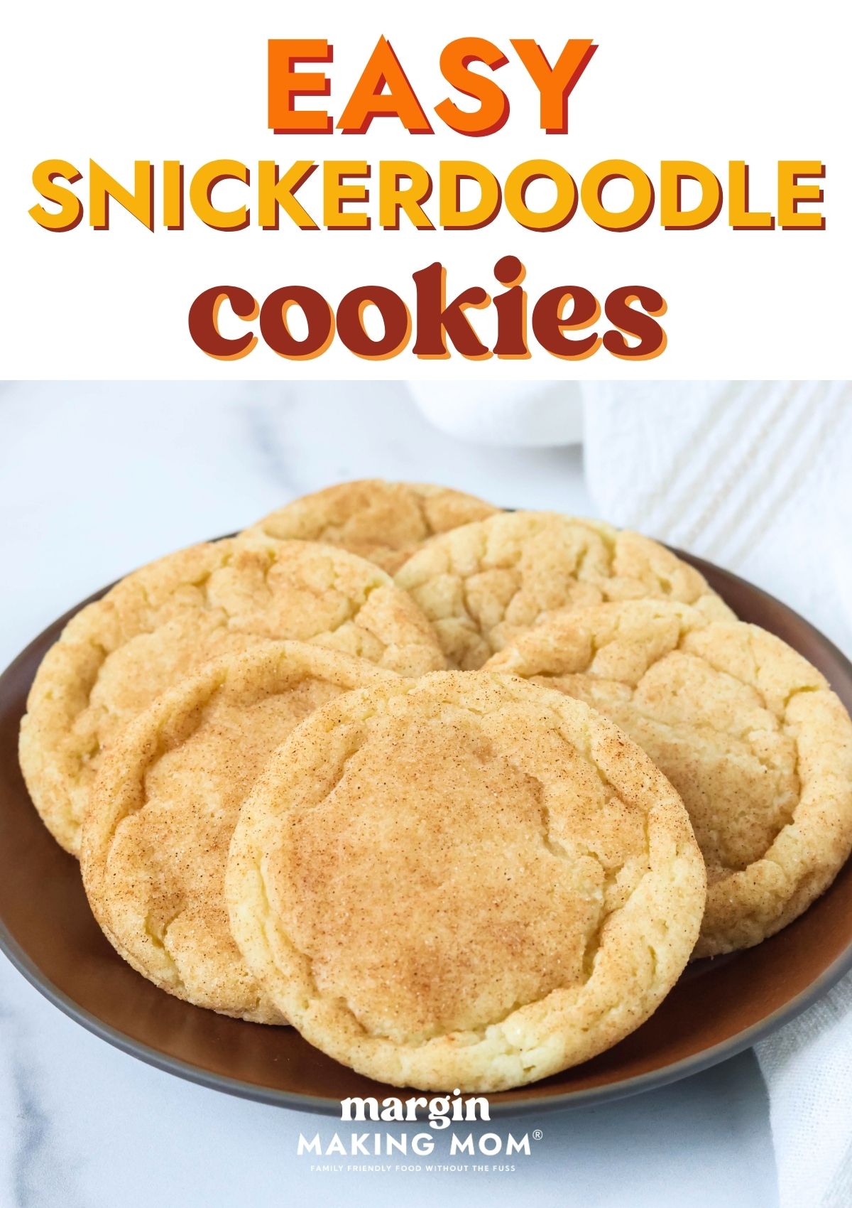 Close-up view of snickerdoodle cookies served on a brown plate.