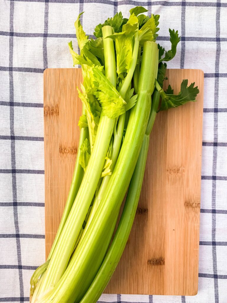 stalk of celery on a cutting board