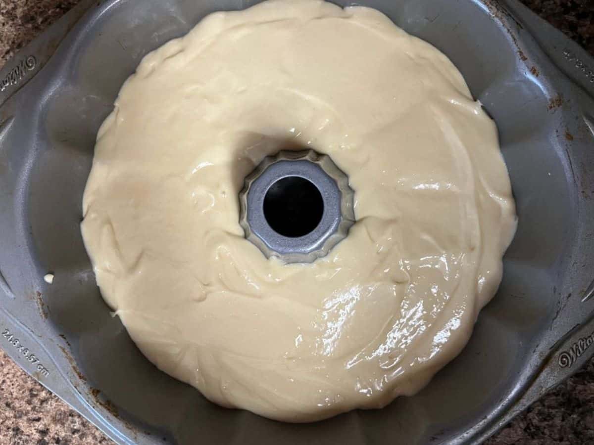 vanilla pudding cake batter added to prepared bundt pan