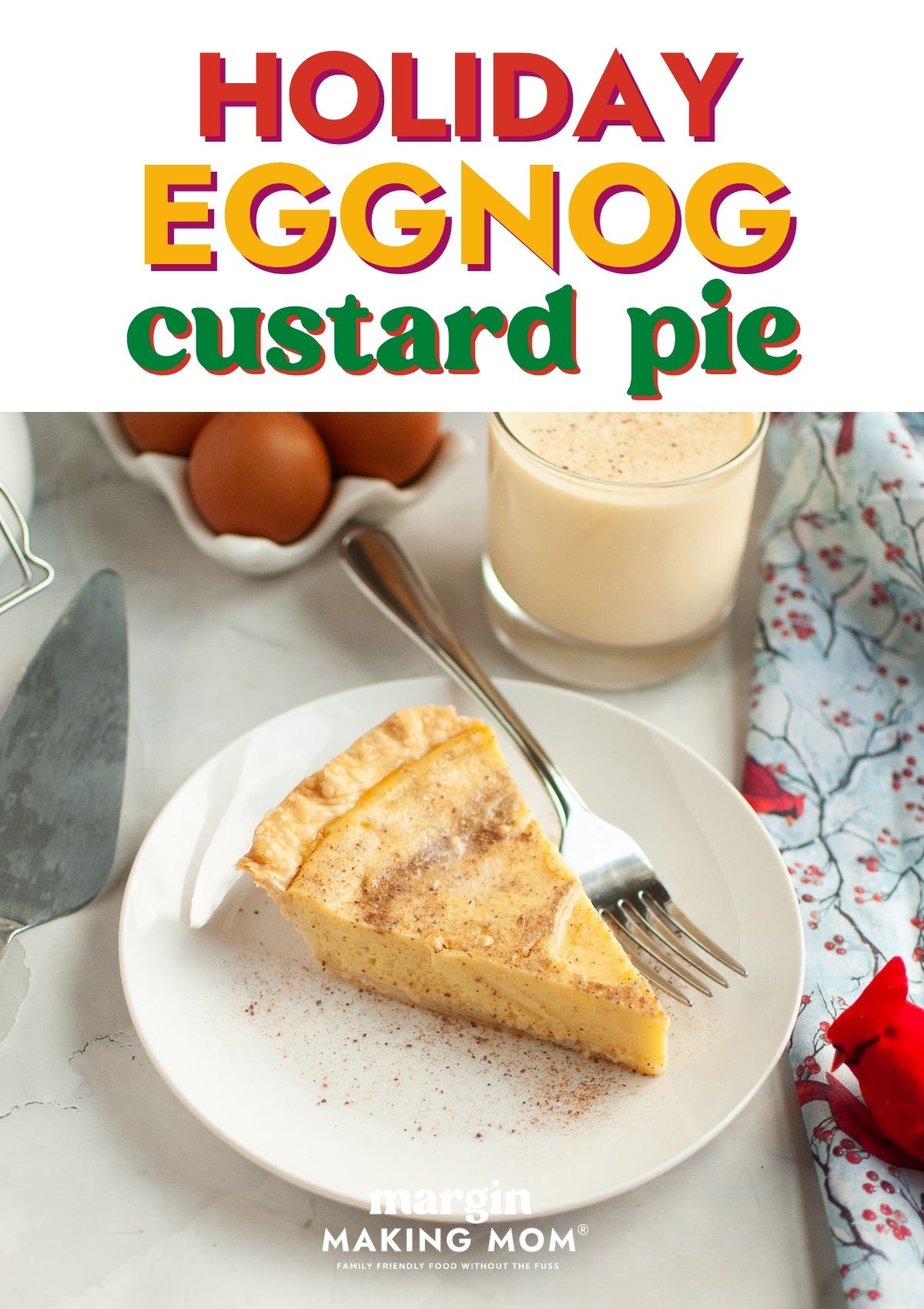 Slice of easy eggnog custard pie on a white plate with a fork. A glass of eggnog is in the background.