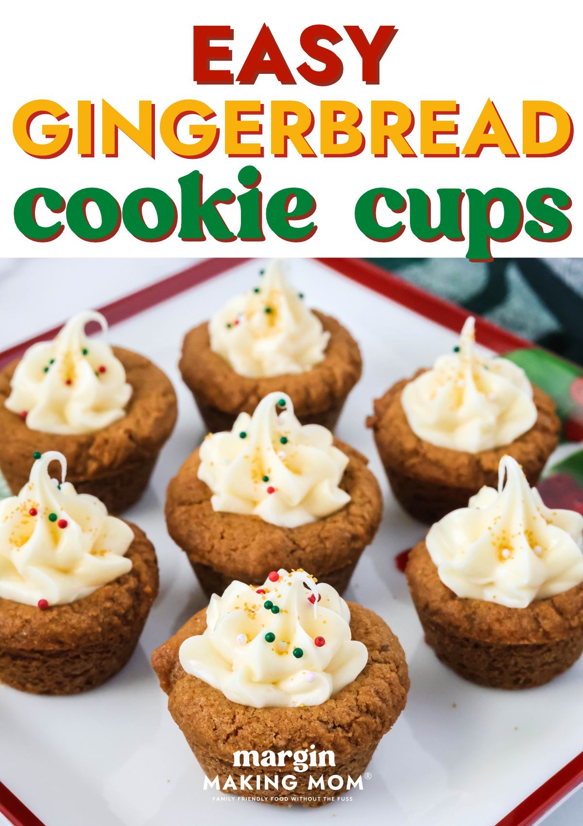 Gingerbread cookie cups decorated with frosting and sprinkles are served on a Christmas plate.