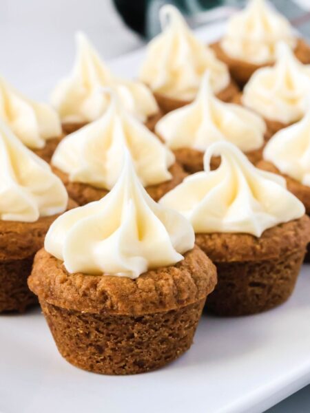 Gingerbread cookie cups served on a white plate.