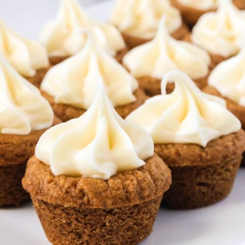 Gingerbread cookie cups served on a white plate.